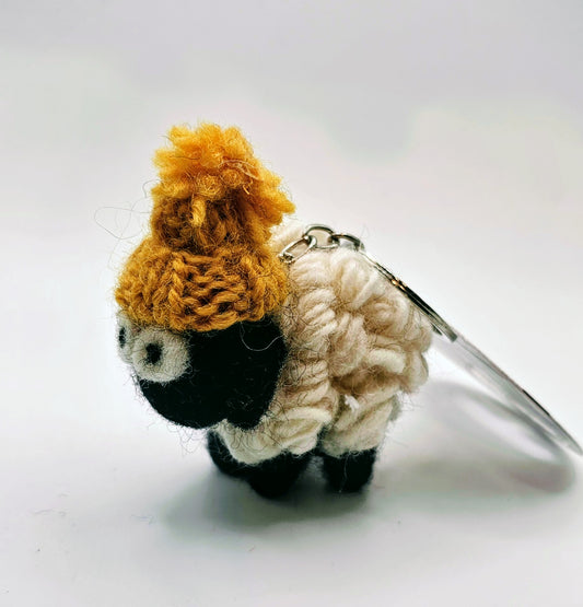 Knitted Sheep Keyring Mountain Blackface with Yellow Bobble Hat